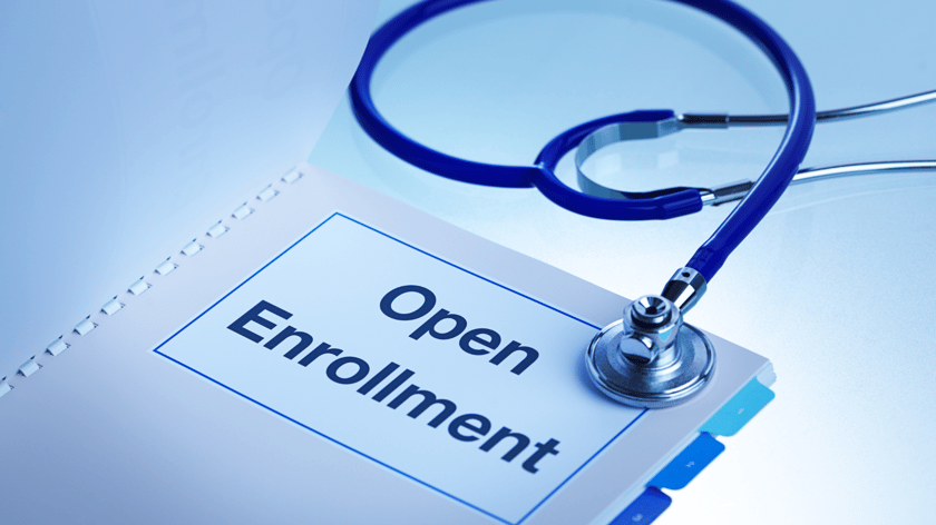 open enrollment file and stethoscope 
